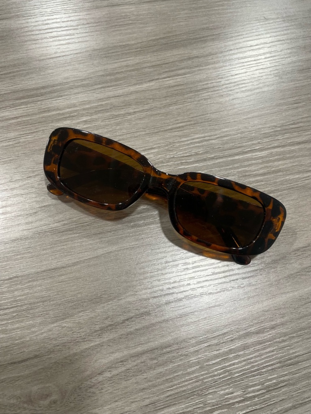 Tortoiseshell square sunglasses with brown lenses